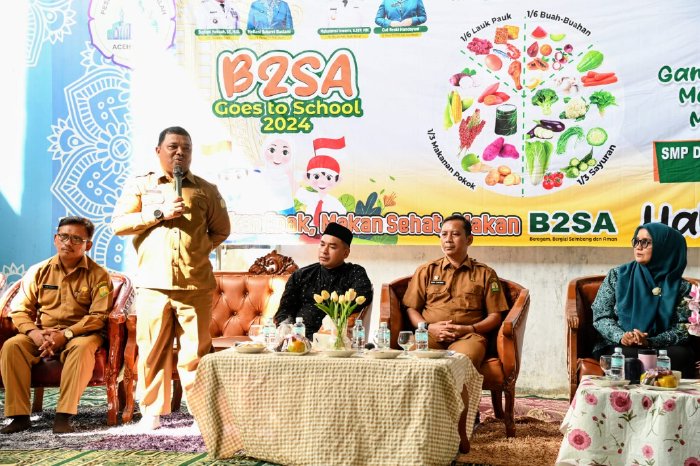 Wakili Pj Bupati, Sekda Aceh Besar Sambut Pj Ketua TP - PKK Aceh Pada Roadshow B2SA di SMP Ruhul Falah Kuta Malaka