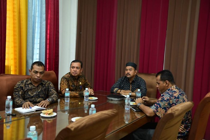 Assisten II Wakili Pj Bupati Aceh Besar Ikuti Zoom Meeting PKS BUMN dan BUMD Sektor Penambangan dan Pengelolaan Sampah