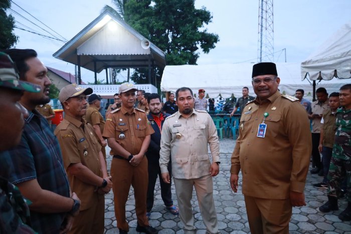 Pj Bupati Aceh Besar Dampingi Pj Gubernur Aceh Tinjau TPS di Gampong Meunasah Krueng